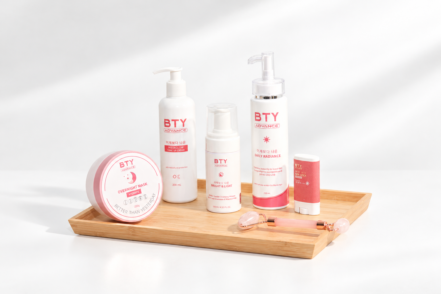 BTY Advance Instaglow, Daily Radiance and other skincare products on a wooden tray
