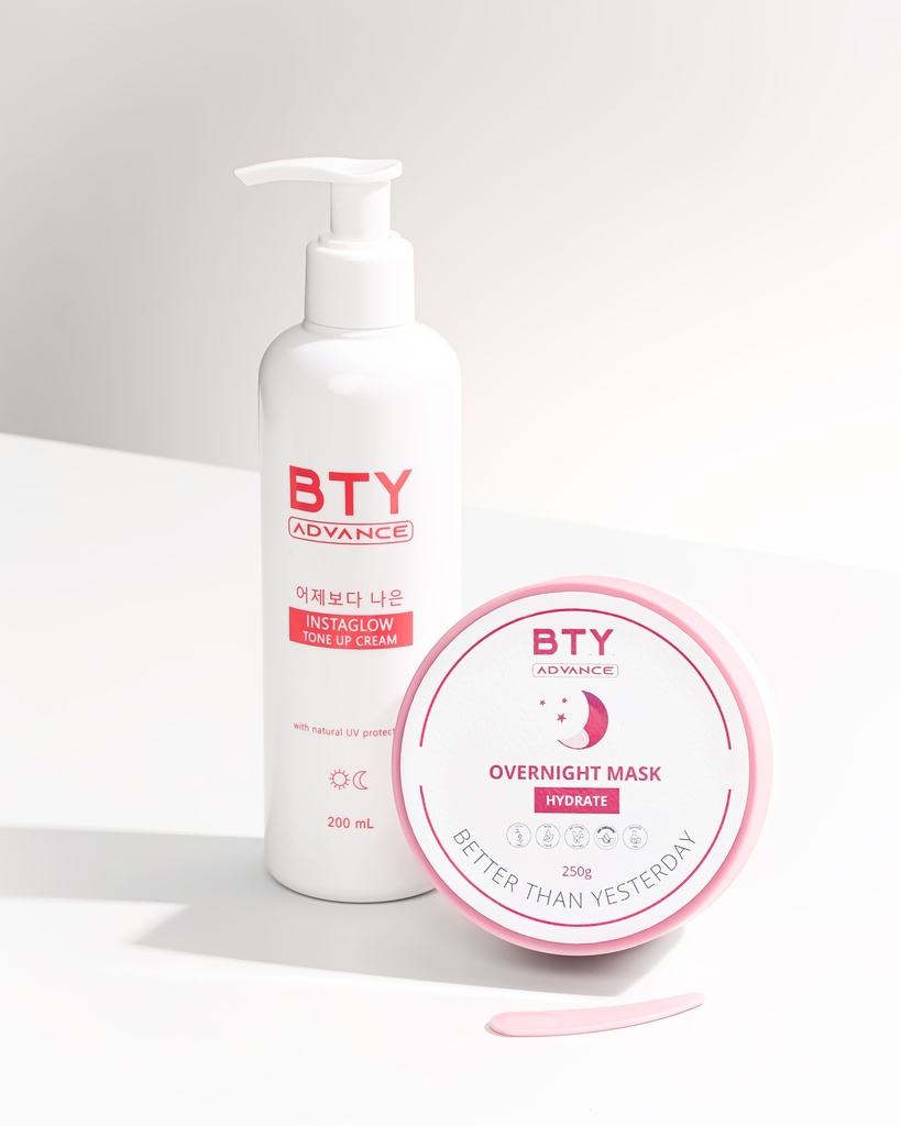 BTY Advance Instaglow and Overnight Mask on a dark table with a city view